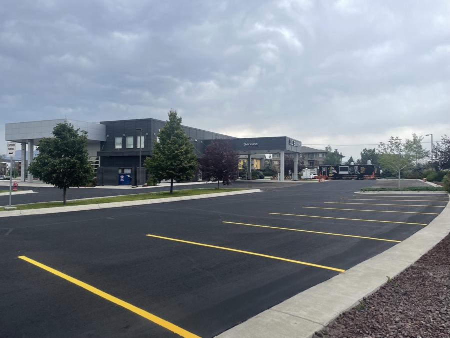 Durable sealcoated asphalt lot built to withstand heavy vehicle use