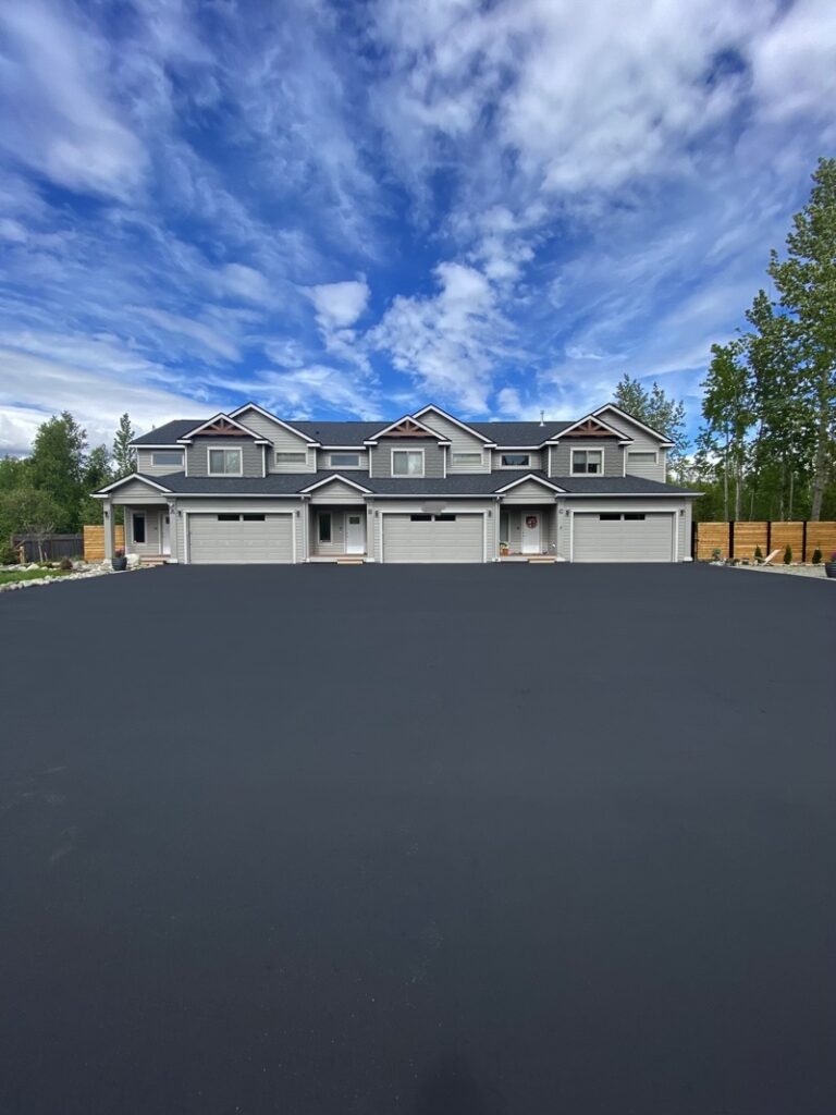 Triplex driveway freshly sealcoated by Montana Sealcoating in Southwest Montana